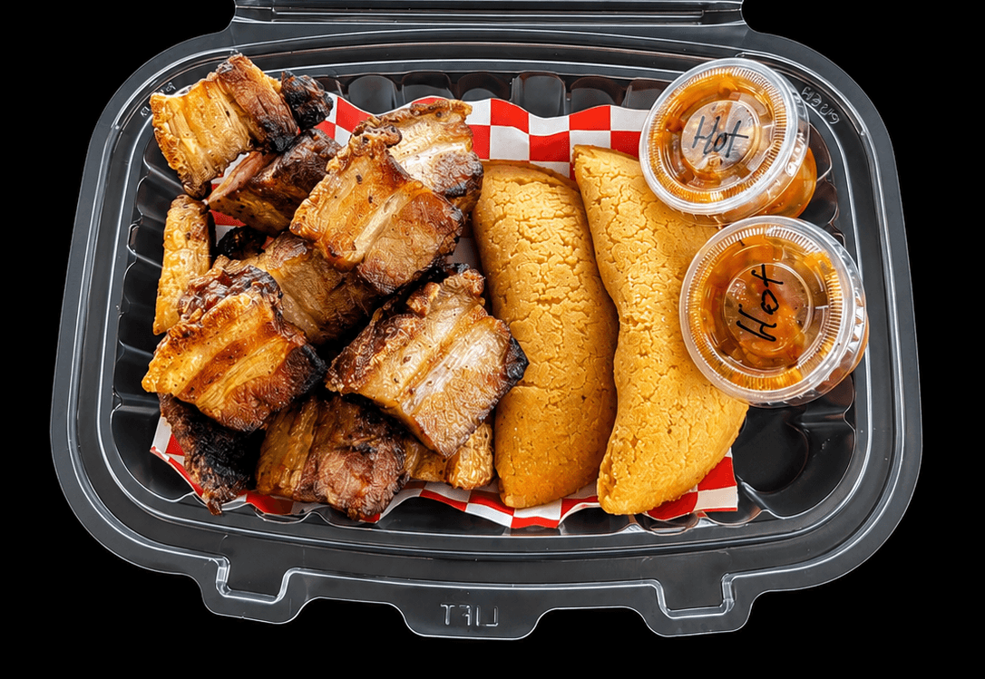 Chicharrón with empanadas and hot salsa